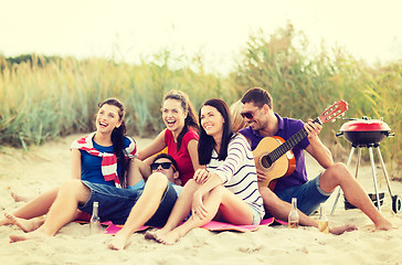 Image showing group of friends having fun on the beach