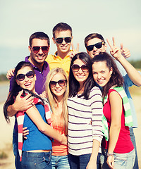 Image showing group of friends having fun on the beach