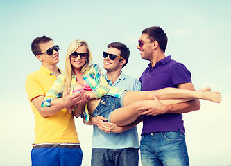 Image showing group of friends having fun on the beach