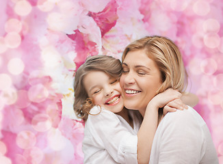 Image showing happy mother and daughter hugging