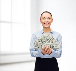 Image showing young businesswoman with dollar cash money