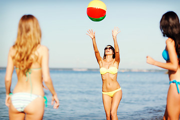 Image showing girls with ball on the beach