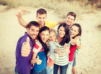 Image showing group of friends having fun on the beach