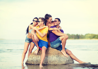 Image showing group of friends having fun on the beach