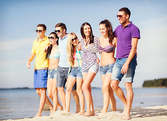 Image showing group of friends having fun on the beach