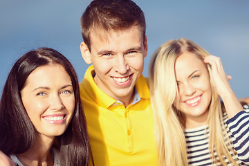 Image showing group of friends having fun on the beach