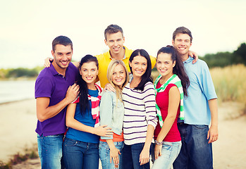 Image showing group of friends having fun on the beach