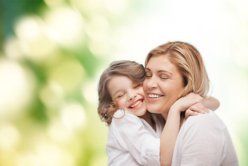 Image showing happy mother and daughter hugging