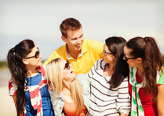 Image showing group of friends having fun on the beach