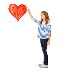 Image showing girl drawing big red heart in the air