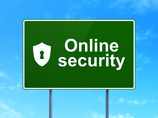 Image showing Safety concept: Online Security and Shield With Keyhole on road sign background