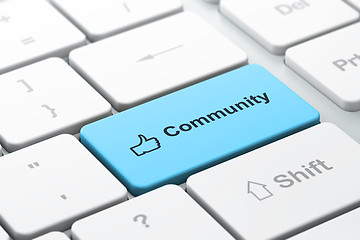 Image showing Social media concept: Thumb Up and Community on computer keyboard background