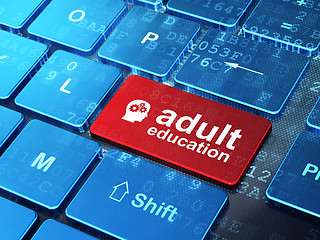 Image showing Education concept: Head With Gears and Adult Education on computer keyboard background
