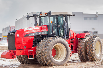 Image showing Test-drive of tractor on special dirt range