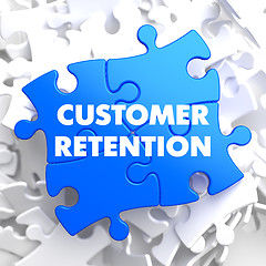 Image showing Customer Retention on Blue Puzzle.