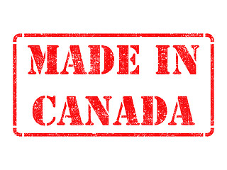 Image showing Made in Canada - inscription on Red Rubber Stamp.