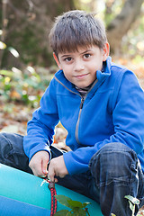 Image showing Little boy in forest