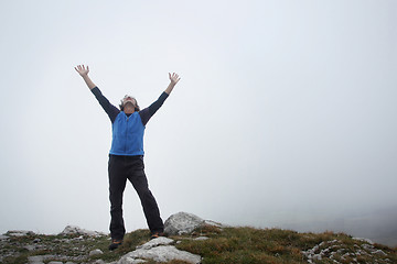 Image showing Man enjoying the mountain