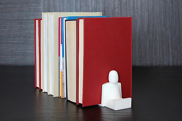 Image showing Books on a wooden shelf