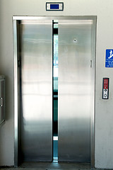 Image showing stainless steel elevator doors closing