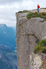 Image showing Woman hiker on Pulpit Rock / Preikestolen, Norway