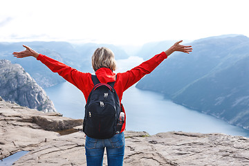 Image showing Woman hiker on Pulpit Rock / Preikestolen, Norway