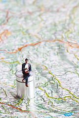 Image showing Miniature people in action on a roadmap