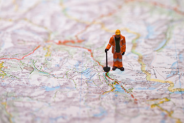 Image showing Miniature people in action on a roadmap