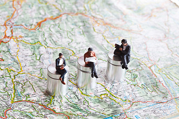 Image showing Miniature people in action on a roadmap