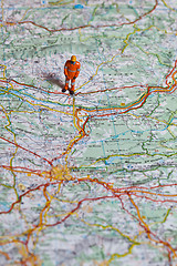 Image showing Miniature people in action on a roadmap