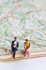 Image showing Miniature people in action on a roadmap