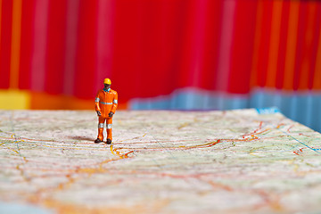 Image showing Miniature people in action on a roadmap