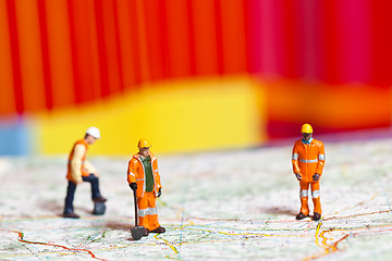 Image showing Miniature people in action on a roadmap