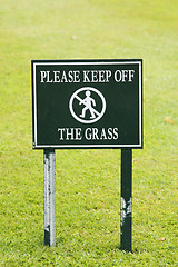 Image showing please keep off the grass sign taken in england july 2007