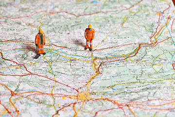 Image showing Miniature people in action on a roadmap