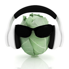 Image showing Green cabbage with sun glass and headphones front 