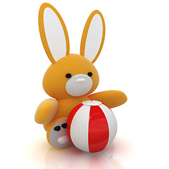 Image showing soft toy hare and colorful aquatic ball