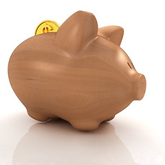 Image showing Wooden piggy bank and falling coins