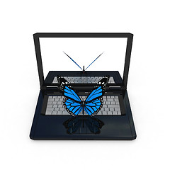 Image showing butterfly on a notebook