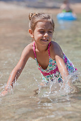 Image showing Happy little girl and sea