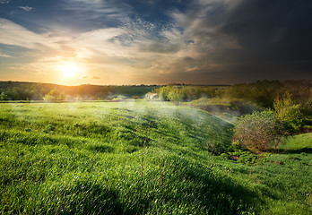 Image showing Storm clouds at sunset