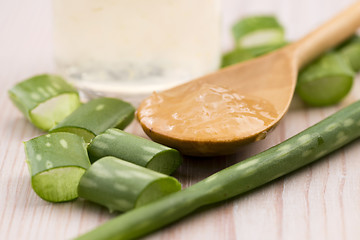 Image showing aloe vera juice with fresh leaves