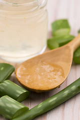 Image showing aloe vera juice with fresh leaves