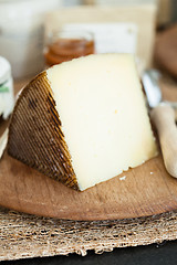 Image showing Cheese on wooden board