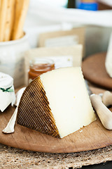 Image showing Cheese on wooden board