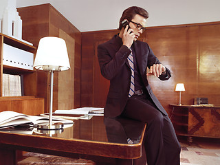 Image showing Businessman working at office desk