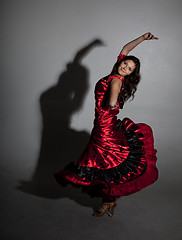 Image showing Young woman dancing flamenco