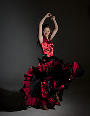 Image showing Young woman dancing flamenco