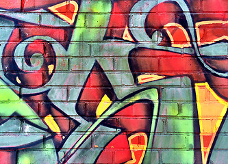Image showing Colorful graffiti detail on a brick wall