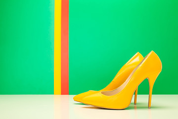 Image showing pair of yellow high heels